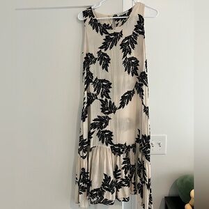 Black patterns on a white fabric maxi dress